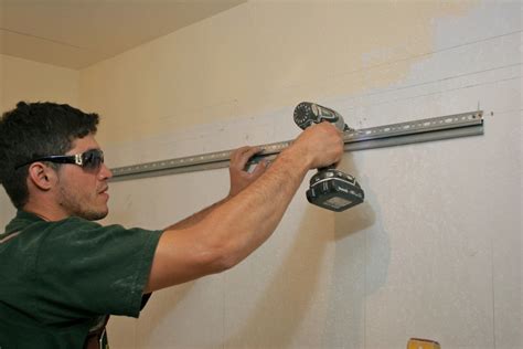 hanging ikea cabinets on steel studs|metal studs cabinet weight.